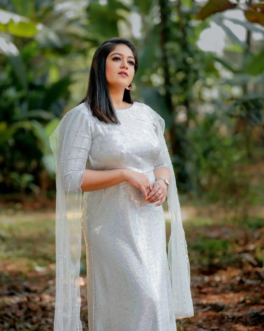 Actress Meghana Raj Stills in Beautiful White Gown